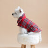 White dog sitting on fur chair wearing Plaid Dog Coat-CiuCiu Bestdograincoats